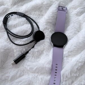 Samsung Purple Smartwatch with Black Charger